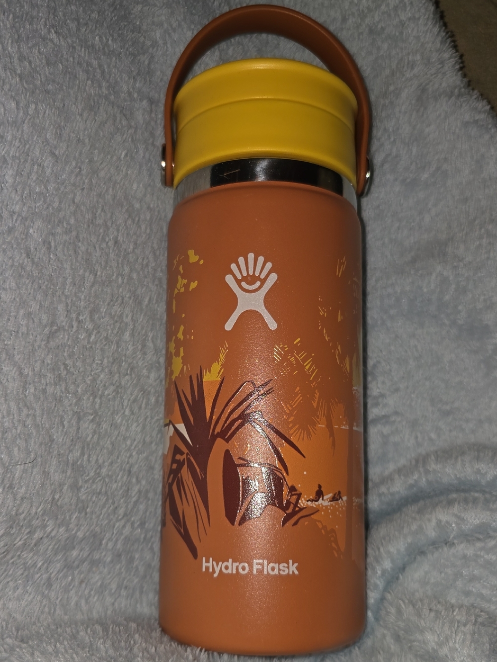 Hydro Flask orange bottle with yellow lid
